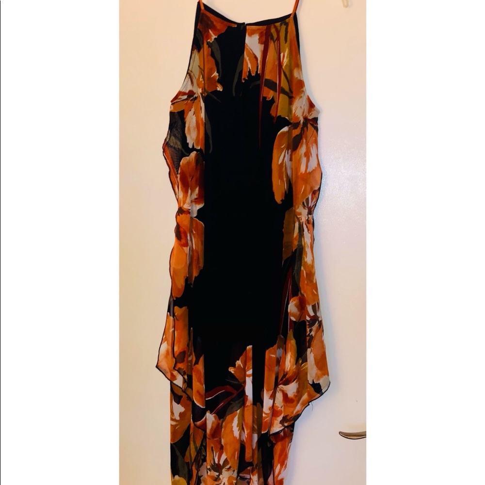 Spaghetti strap floral dress with Hanker chief hem